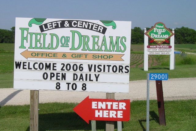 Two signs mark the entrances to the Field of Dreams. Author: Madmaxmarchhare CC BY 2.5 