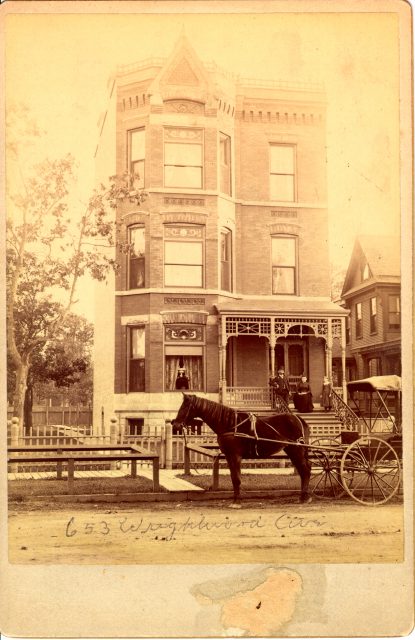 This is an 1880s photo of 653 W. Wrightwood (now 655 W. Wrightwood) in the Lincoln Park neighborhood. The building is typical of the Victorian era structures in the area. Note the wooden sidewalk and dirt road.