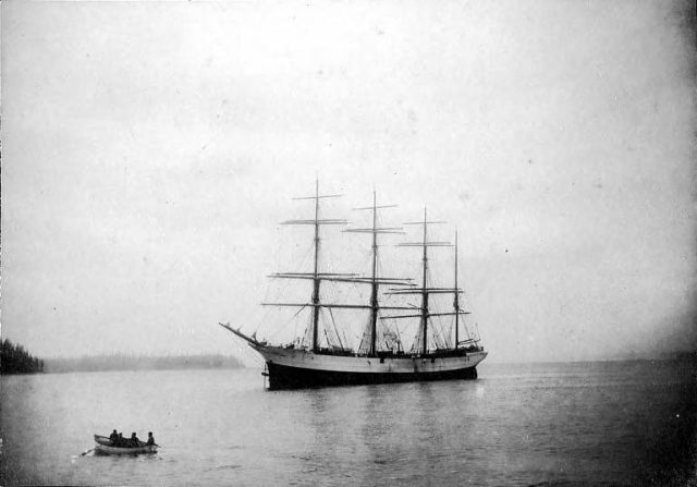 Four-masted ship Peter Iredale at anchor. (Taken some time in 1900). 