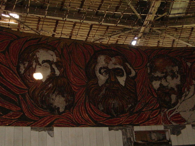 Murals of Friedrich Engels, Karl Marx, and Vladimir Lenin.  