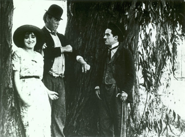 Mabel Normand, Mack Sennett, and Charles Chaplin in The Fatal Mallet (1914).