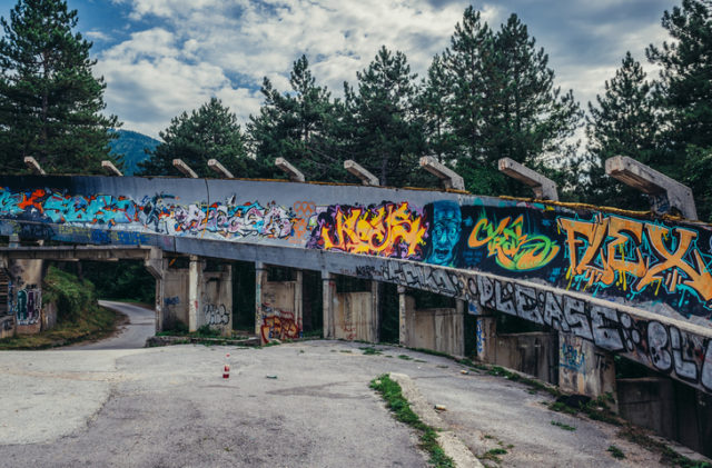 Sarajevo, Bosnia and Herzegovina – August 24, 2015. Abandoned Olympic Bobsleigh and Luge Track, built for the XIV Olympic Winter Games in 1984 and destroyed during Siege of Sarajevo
