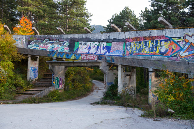 Sarajevo, Bosnia and Herzegovina – October 14, 2013: The abandoned bobsled and luge track from the 1984 Winter Olympics in Sarajevo, Bosnia and Herzegovina. During the siege of Sarajevo (1992-1995), the track was used as an artillery position by Bosnian Serb forces. 