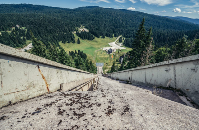 Ilidza, Bosnia and Herzegovina – August 24, 2015. Abandoned Olympic Jumps on the mountain of Igman in Ilidza. The Objects was built for Winter Olympic Games in 1984