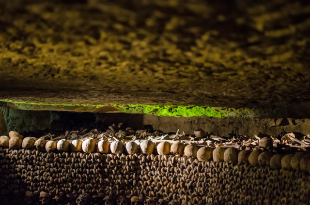 The Catacombs of Paris are located south of the former city gate and hold the remains of about six million people. The skeletons fill a renovated section of caverns and tunnels that are the remains of historical stone mines, giving it its reputation as “The World’s Largest Grave”. Opened in the late 18th century.