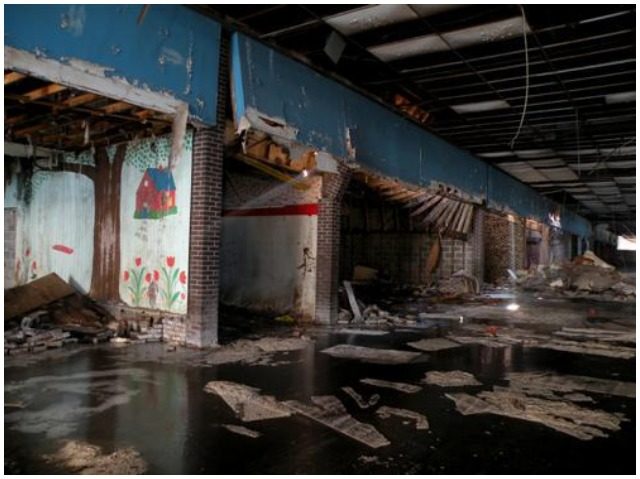 Image of “Block B” of Dixie Square Mall – The interior is completely wrecked, left to rot. jonrev, CC BY-SA 3.0
