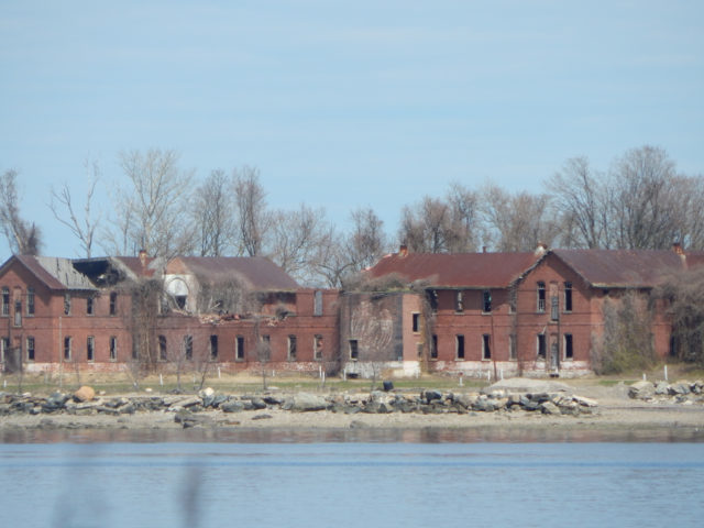 Red Brick Buildings on Hart Island. Author: Adam Moss CC BY-SA 2.0