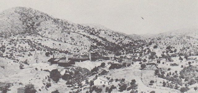 Washington Camp, facing west in 1909. The large mine buildings are the Duquesne Reduction Plant