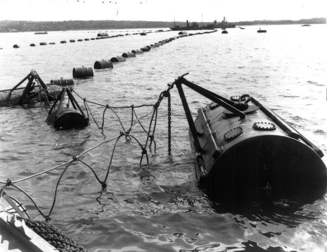 An anti-submarine net running between York Redoubt and McNabs Island; 1 May 1942.