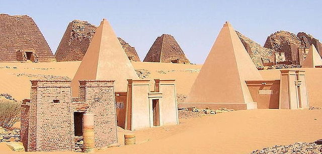 Wide view of Nubian pyramids at Meroë. Three of the pyramids are reconstructed.