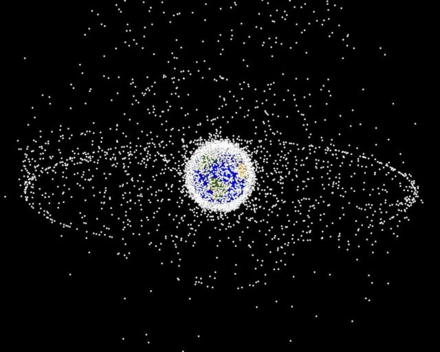 Debris plot by NASA. A computer-generated image of objects in Earth orbit that are currently being tracked. Approximately 95% of the objects in this illustration are orbital debris, i.e., not functional satellites.