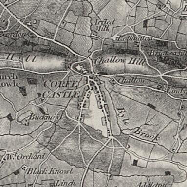 Ordnance Survey map of Corfe Castle in 1856, showing the castle and village in the gap of the Purbeck Hills