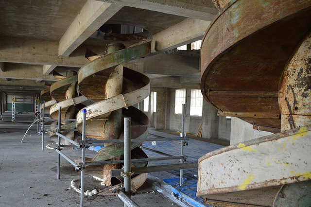 Factory floor with spiral chutes. Author: Matt Brown. CC BY 2.0