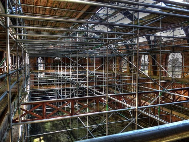The Main Hall held up with scaffolding after a major fire. Author: Sandyjune96 GFDL