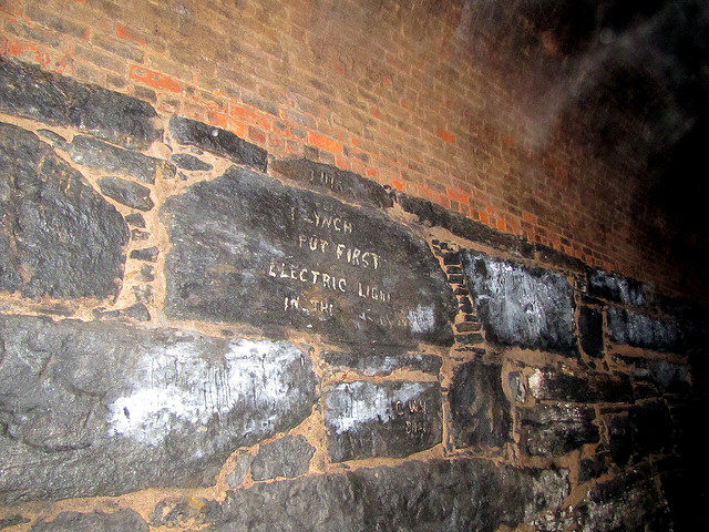 Writings indicating who installed the first electric light in the tunnel. Author: David Berkowitz CC BY 2.0