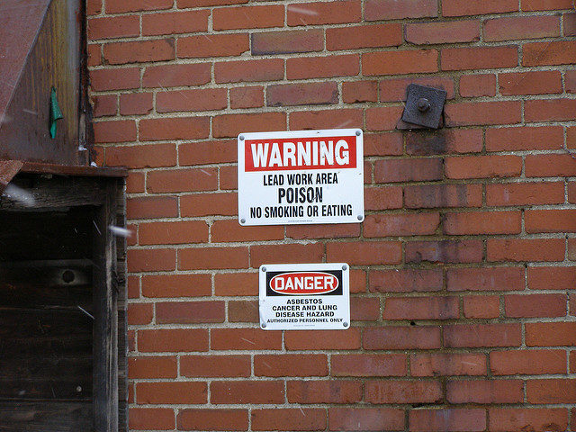 Asbestos cancer and lung disease hazard sign. Author: Mike CC BY-ND 2.0