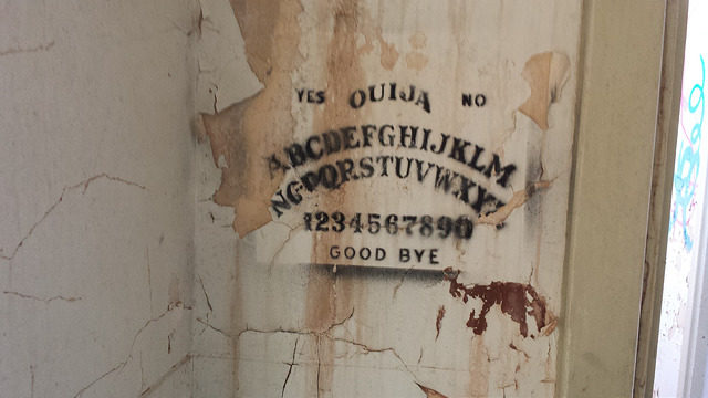 Ouija game board graffiti. Author: Bailey Hurlow CC BY-SA 2.0