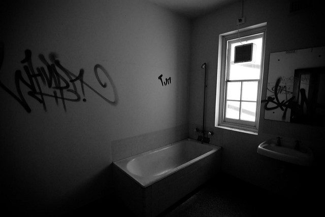 Surprisingly well-preserved bathroom. Author: Nate Robert CC BY 2.0