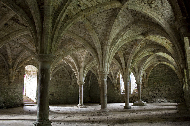 The abbey was designed in the French Romanesque architectural style. Author: Rick Rowland. CC BY 2.0