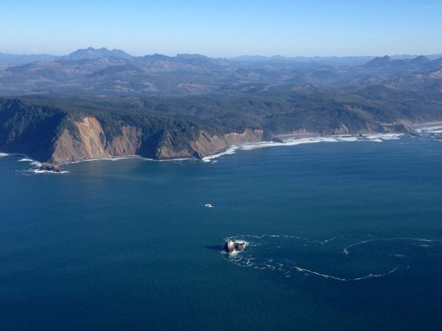 Aerial photo of the rock and the lighthouse from 2014. Author: Eric Prado CC BY-SA 4.0