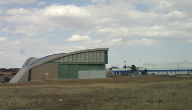 One of Stapleton hangars. Author: Xnatedawgx CC BY-SA 3.0