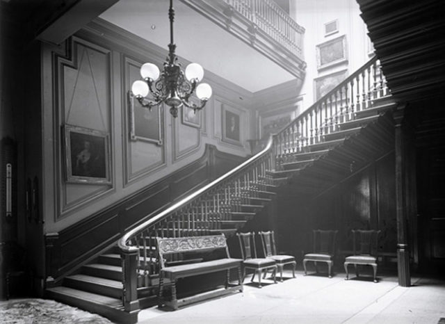 The mahogany staircase. Author: Unknown – Country Life, 15 February 1919