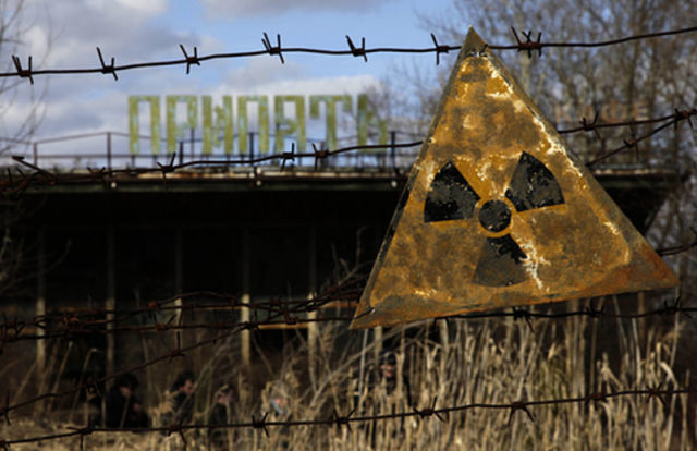 A radioactive sign outside of Pripyat. Author: Diana Markosian