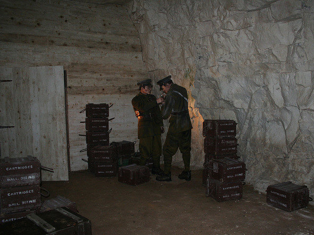 Soldiers and boxes of ammunition. Author: Jon’s pics CC BY 2.0