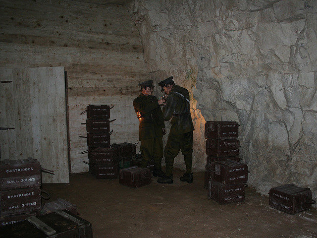 Soldiers and boxes of ammunition. Author: Jon’s pics CC BY 2.0