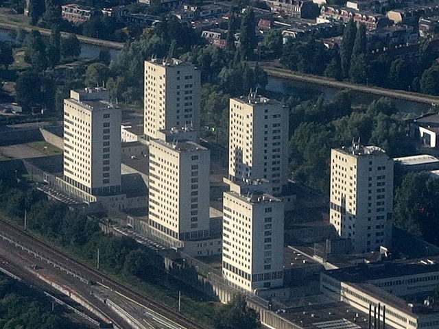The six towers of the Bijlmerbajes as seen from the air/ Author: Mark Ahsmann – CC BY-SA 4.0