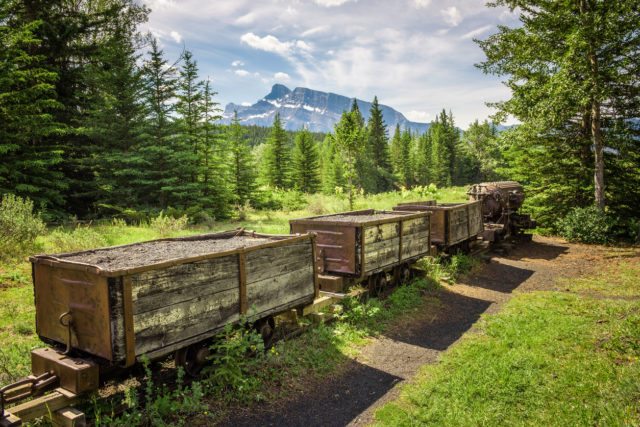 Historic coal mine train in the ghost town of Bankhead with Mt. Rundle in the background located in Banff National Park, Alberta, Canada.