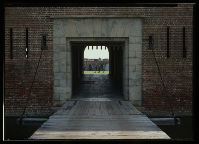The red brick walls and the entrance. Author: http://www.loc.gov/pictures/item/ga0120.color.376617c Public Domain
