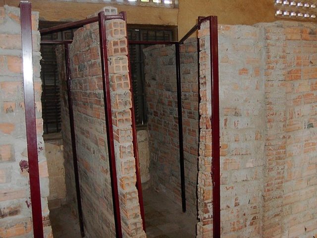 Former school rooms divided into cells. Author: Adam Carr – CC BY-SA 3.0