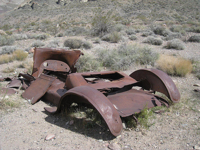 Abandoned vehicle – Author: The Greater Southwestern Exploration Company – CC BY 2.0
