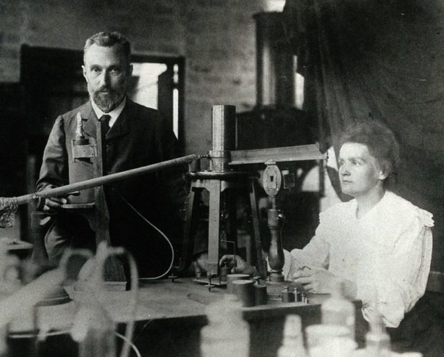 Pierre and Marie Curie in the laboratory.
