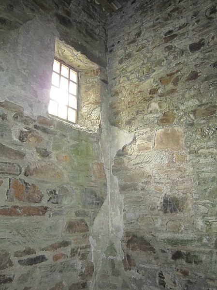 The grim view from inside one of the prison cells. Author: Robert Linsdell CC BY 2.0