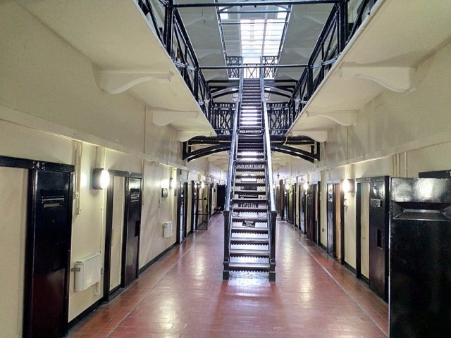 C-Wing of Crumlin Road Gaol shows the brutal prison architecture. Author: GrimsbyT CC BY-SA 4.0