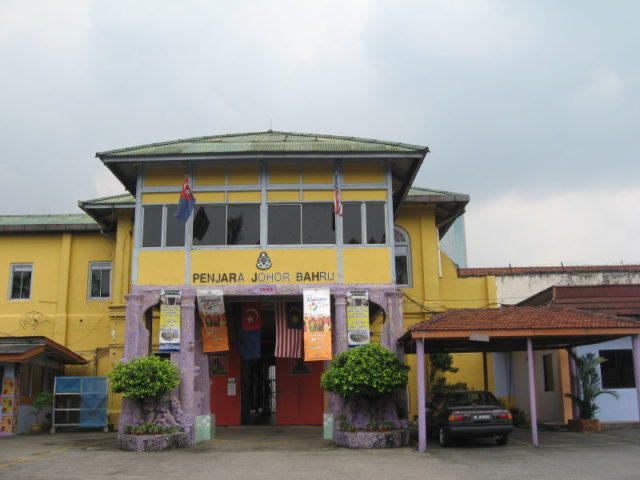 Entrance to the main administrative building. Author: Terence Ong CC BY 2.5