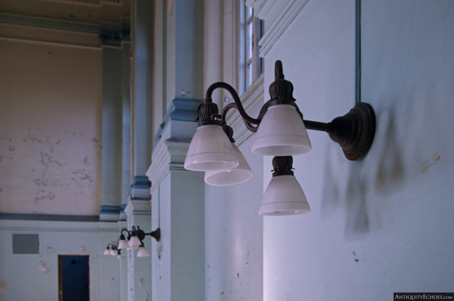 Light fixtures on the wall of the hospital