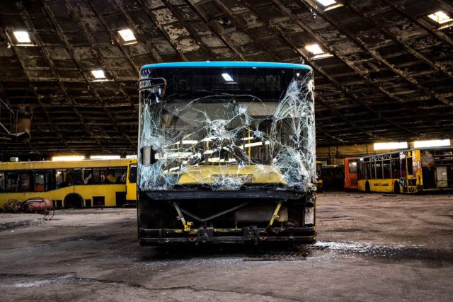 Abandoned bus with a smashed front window
