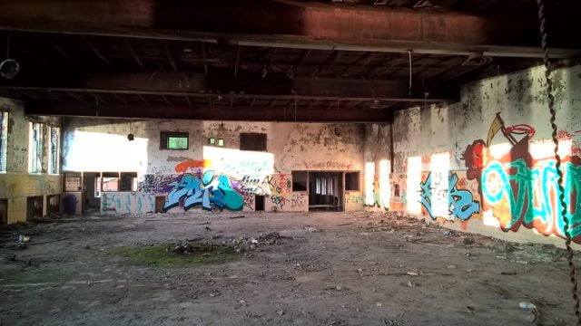 Graffiti-covered room at Burwash Correctional Center