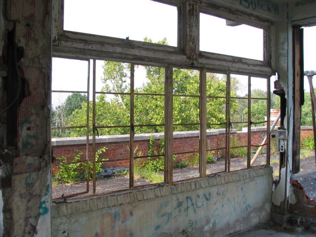 Looking outside through windows at the Waverly Hills Sanatorium