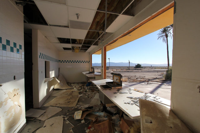 Rubble across the interior of a food vending building at Rock-A-Hoola Waterpark