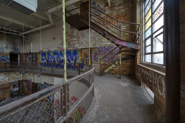 Abandoned building with its interior covered in graffiti