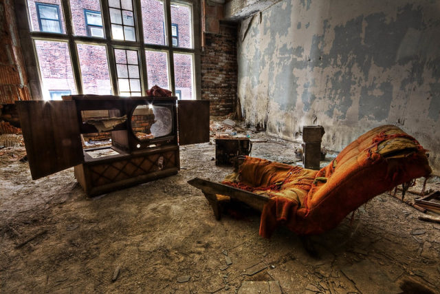 Rotting furniture in an abandoned building