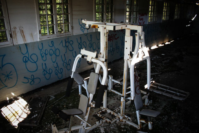 Exercise machines in the middle of a room