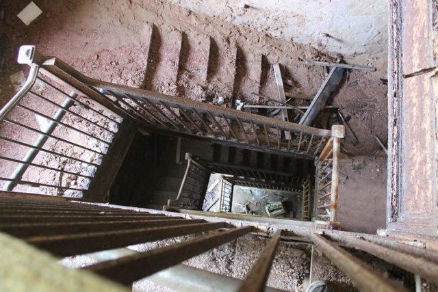 Looking down a staircase at Forest Haven Asylum