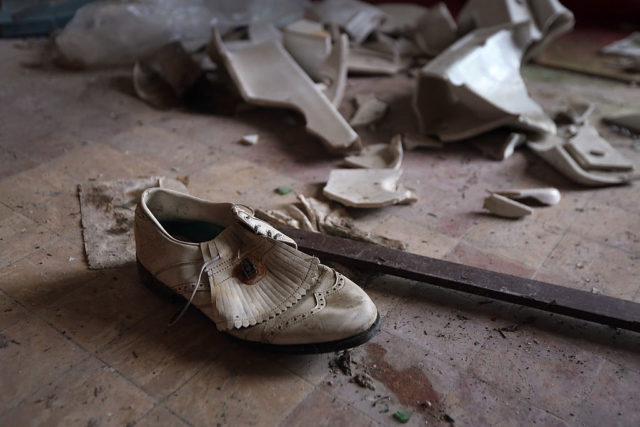 Abandoned shoe on the ground
