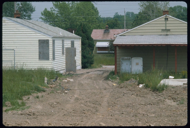 Boarded-up buildings on an abandoned property