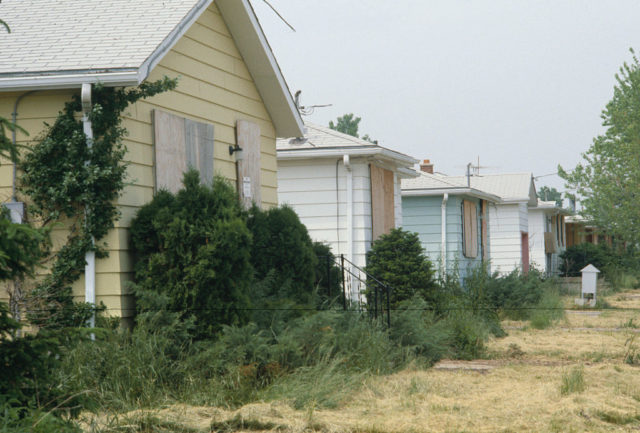 Row of boarded-up homes